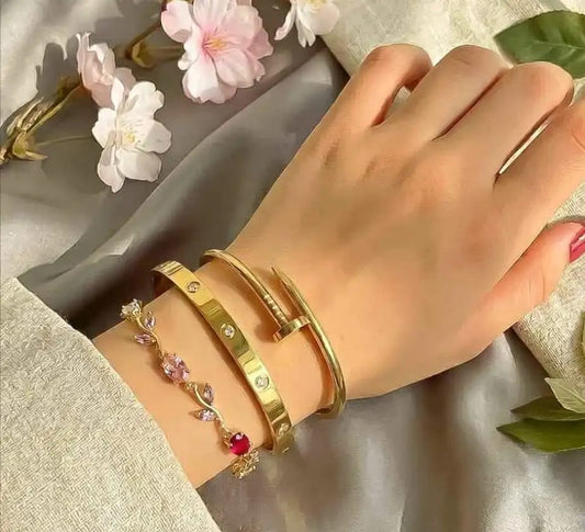 Pink stone bangle stack worn on wrist