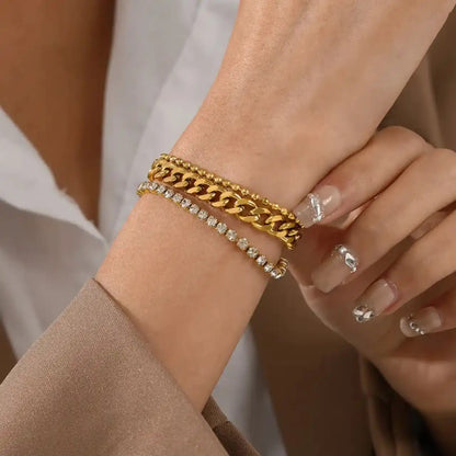 Cuban chain and tennis bracelet worn on wrist